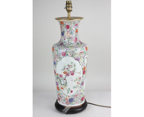 A Chinese porcelain baluster vase converted to a table lamp, with polychrome decoration of flowers and butterflies, 57cm high