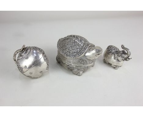 Three Asian silver plated trinket boxes modelled as an elephant, a turtle and an apple