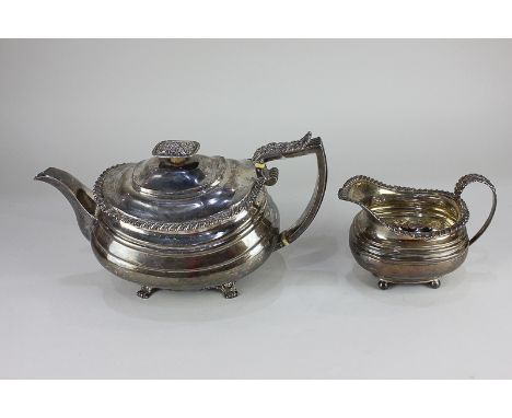 A George IV silver teapot, makers John &amp; Henry Lias, London, 1822, with gadroon border and floral embossed embellishments