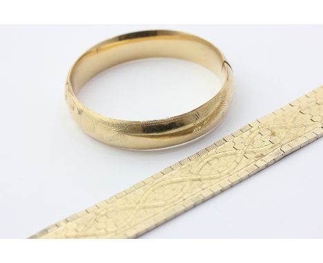 A 14ct yellow gold hinged bangle and a gilt metal bracelet, 20g weighable 