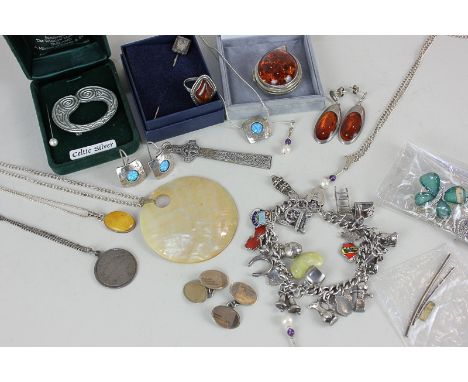 An amber pendant in silver with ring and earrings, and a quantity of silver mounted jewellery