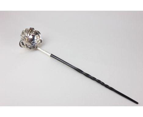 A George II silver punch ladle, oval bowl with scallop border and twisted whalebone handle, marks rubbed, London 1747