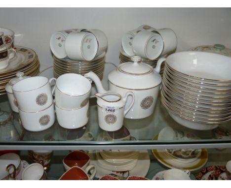 A Royal Limoges ''Renaissance Gold'' Teaset comprising twelve cups and saucers, side plates, plus twelve soup and dessert bow