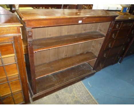 A Walnut floor standing Bookshelves having adjustable shelf height, 48" wide, 45 1/2" high and 10 3/4" deep.