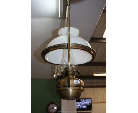 A Brass oil Lamp with shade