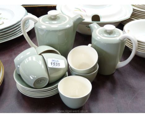 A pale green and cream Poole coffee set comprising six cups and saucers, coffeepot, hot water jug and sugar basin.