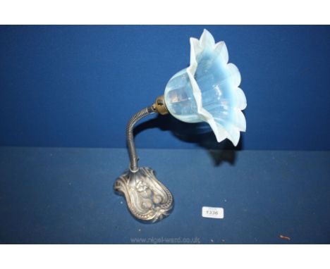 A vintage Lamp with vaseline glass shade