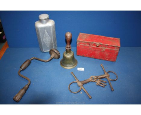 A red Tool Box for a tractor (probably David Brown), old brace drill, horse bit and metal bottle.