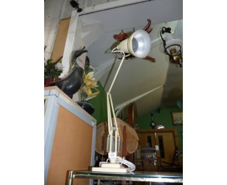 A Herbert Terry, square based angle poise lamp in ivory/cream colour.