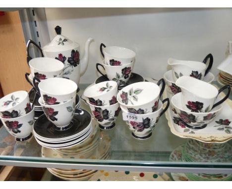 A Royal Albert 'Masquerade' coffee set including six cups, saucers, coffee pot and milk and sugar bowl along with a Royal Alb