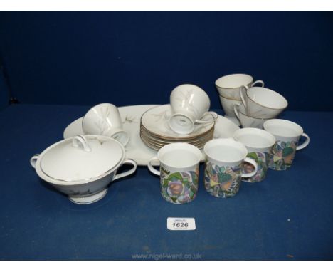 A quantity of Rosenthal crockery in grasses pattern (3687)comprising six cups and saucers, oval serving plate and lidded suga