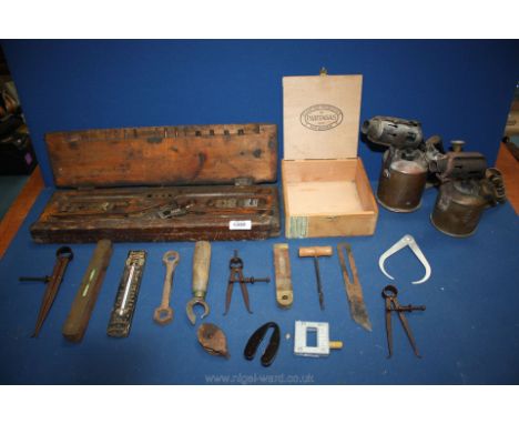 A quantity of vintage tools and burners in brass.