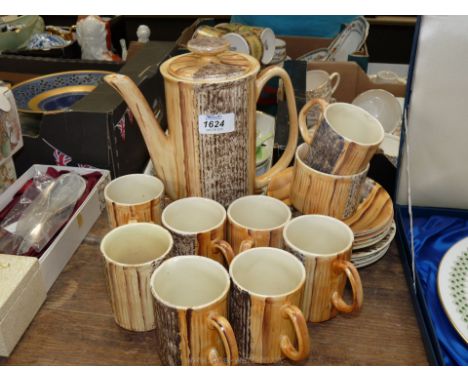 A quantity of Price Kensington tea/coffeeware to include a coffee pot, sugar and creamer, plus cups and saucers in two colour