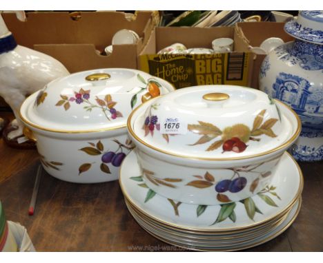 A quantity of Royal Worcester Evesham including large casserole dish, smaller casserole dish and six steak plates.