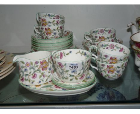 A Minton Haddon Hall part Teaset including six cups and saucers, two small dishes, small oval dish, sandwich plate and sugar 