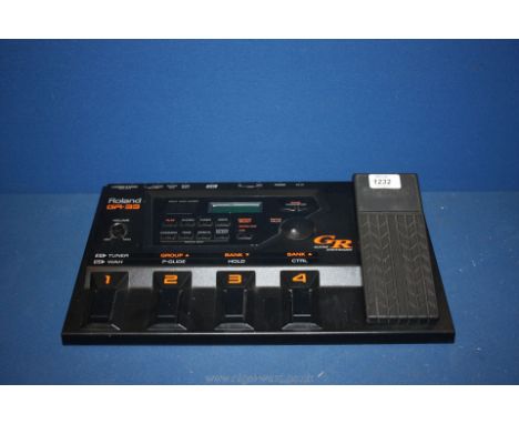 A Roland GR-33 guitar synthesizer.