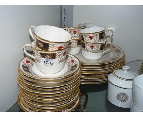 A Crown Derby 'Derby Borders part Dinner service (seconds) including eight large plates, eight cups and eleven, saucers, etc.