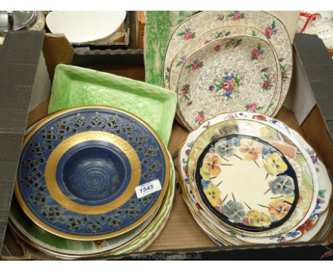 A quantity of miscellaneous plates including two small Royal Doulton 'pansy' side plates, 'Midwinter' three-tier cake stand, 