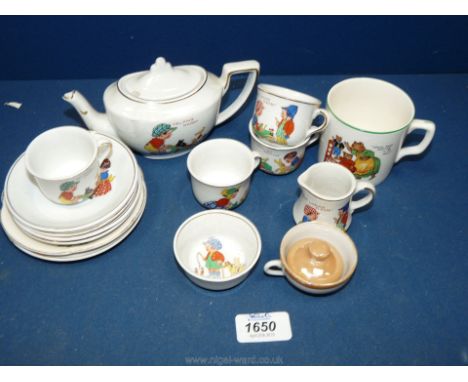 A vintage child's Teaset "Helping Daddy" to include teapot, four cups and saucers, side plate, milk jug and sugar bowl as wel