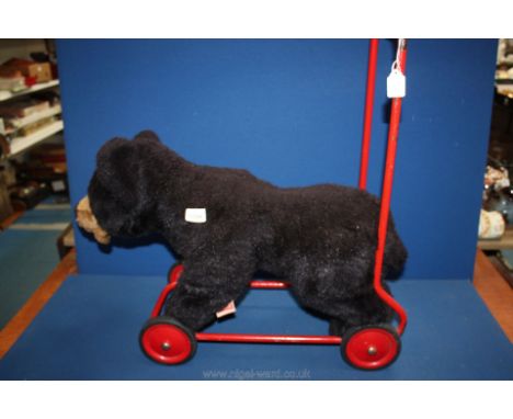 A Deans 'push along' Honeybear vintage toy.