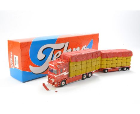 Tekno Diecast Model Truck comprising No. 82667 Scania CS Truck with Trailer with straw load in the livery of Vandemoortel. Ap