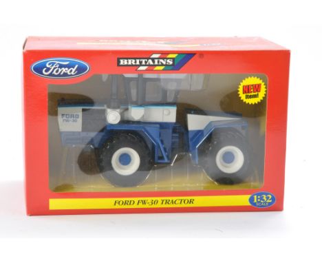 Britains 1/32 No. 42107 Ford FW30 Tractor. Excellent and secure in generally excellent box. 