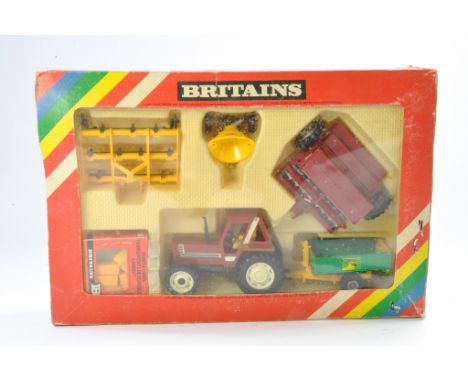 Britains 1/32 No. 9591 Fiat Tractor and Implement Set. Contents look to be excellent in fair box, flaps missing one end and g