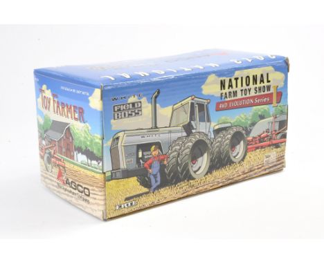 Ertl 1/32 Toy Farmer NFTS White Field Boss Tractor. Excellent and secured in box with no obvious sign of wear. 