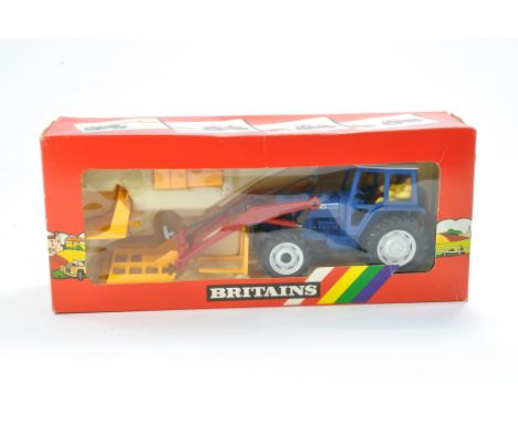 Britains No. 9584 Ford 7710 Tractor and Front Loader. Excellent in good to very good box, some minor creasing and scuff to ca