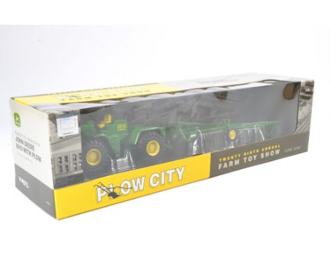 Ertl 1/32 Plow City 2009 John Deere 8010 Tractor with Plough. Excellent and secured in box with no obvious sign of wear. Also