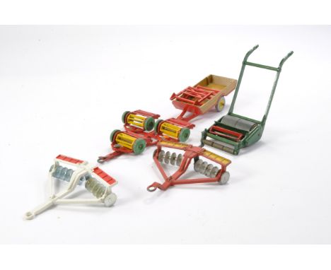 A group of Dinky farming implements as shown. Trailer has tow eye broken off, otherwise generally good. 