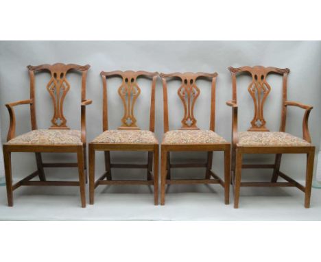 A SET OF EARLY 20TH CENTURY OAK FRAMED DINING CHAIRS, of Chippendale design, comprising; six singles and a pair of carvers, p