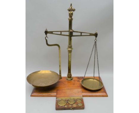 19TH CENTURY BRASS BEAM BALANCE SCALES "Class B to weigh 2lbs", on mahogany plinth base, together with a boxed set of seven w