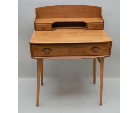 AN ERCOL LIGHT ELM WRITING TABLE, circa 1960's, having shelved superstructure, fitted two small drawers, on a box top, fitted