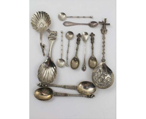 A SELECTION OF SILVER ITEMS to include a Dutch silver caddy spoon, a Windmill spoon with Dutch tavern scene in bowl, two Dutc