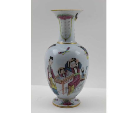 A CHINESE CERAMIC VASE of baluster form, with flared neck on circular platform base, hand painted decoration of figures, a va