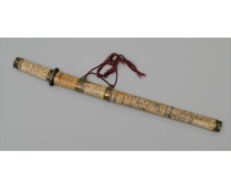 A JAPANESE SHORT SWORD (TANTO) with decoratively carved bone handle and scabbard, with brass mounts, bearing Mons, overall 54