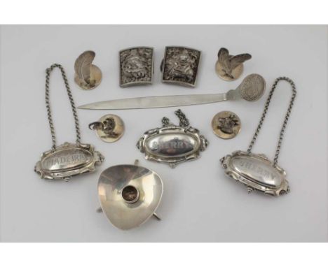 A SELECTION OF SILVER ITEMS to include an Indian silver buckle embossed with two deities, a Danish silver candlestick, silver