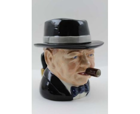 A "BAIRSTOW MANOR POTTERY" limited edition teapot, "The Yalta Tea Party" 59/750, of Winston Churchill with Stalin handle 