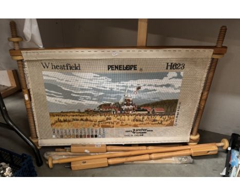 A large unstarted tapestry on frame (No threads)