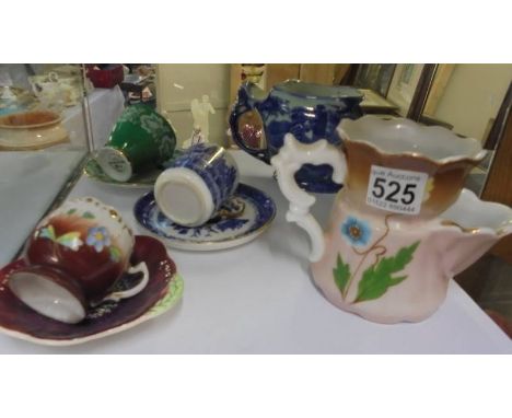 Two shaving mugs and three tea cups and saucers.