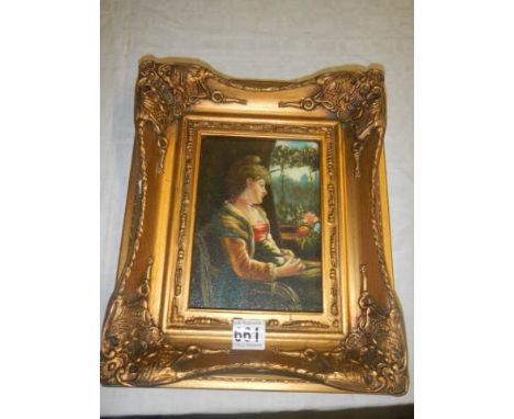 A gilt framed over painted print of a young lady. 30 x 25 cm.