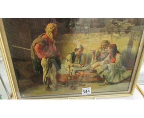 A  framed and glazed lithograph featuring an Arabic scene signed P Ivanovitch. COLLECT ONLY.37.5 x 29cm