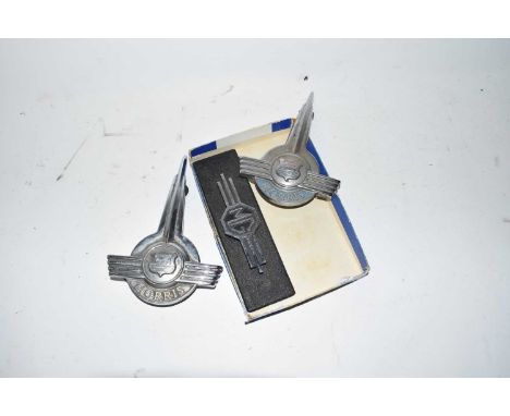 Three vintage car badges, two marked Morris, one marked MG