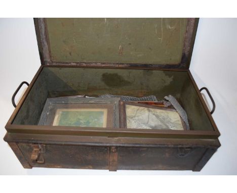 Vintage military trunk containing assorted pictures