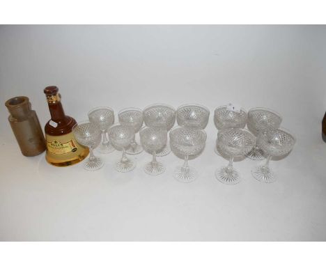 Mixed Lot: Clear champagne bowls together with a Wade scotch whiskey bell and a further stone ware jar