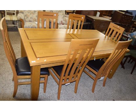 Modern light oak dining table and six chairs