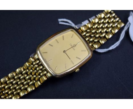 An Omega De ville gold plated gentlemans quartz dress watch, cal 1378, Eta movement, 26mm case, on Omega bracelet. 