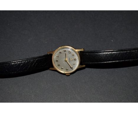 An Omega ladies 9ct gold manual wristwatch,&nbsp;Birmingham 1965, cal 620, movement number 22514656, on black leather strap, 