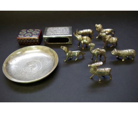 A Japanese .90 silver pin dish inset coin; together with eight metal animal place name holders; a metal matchbox cover stampe